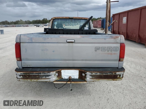 1992 Ford F-150 with VIN 1FTDF15Y2NLB00580, listed as a Copart auction lot 76871004 with 0 mi miles and Salvage Title. Bid and sale history available at carsss.com. Image 6.