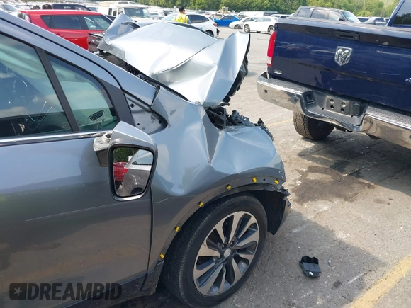 2019 Buick Encore Essence with VIN KL4CJGSM1KB890660, listed as a IAAI auction lot 40010798 with Not Provided miles and . Bid and sale history available at carsss.com. Image 18.