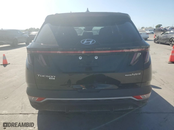 2022 Hyundai Tucson Hybrid Blue with VIN KM8JBCA18NU020788, listed as a Copart auction lot 77478784 with 31,727 mi miles and Salvage Title. Bid and sale history available at carsss.com. Image 6.