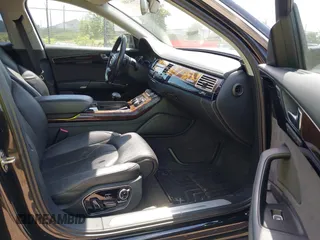 2011 Audi A8 with VIN WAURVAFD6BN005425, listed as a IAAI auction lot 42623409 with 264,365 mi miles and . Bid and sale history available at DreamBid. Image 5.