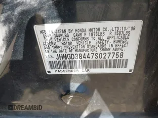 2007 Honda Fit with VIN JHMGD38447S027758, listed as a IAAI auction lot 42015742 with 201,611 mi miles. Bid and sale history available at carsss.com. Image 9.