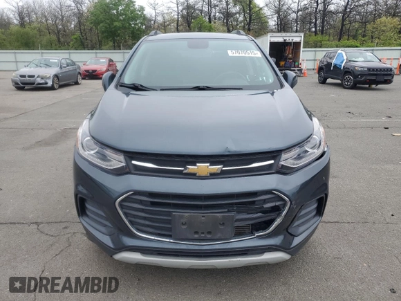 2021 Chevrolet Trax LT z VIN KL7CJLSM4MB365607, wystawiony jako Copart lot #57070515 z przebiegiem 67 813 mil mil oraz Szkoda całkowita • Salvage title. Historia ofert i sprzedaży dostępna na DreamBid. Obrazek 5.
