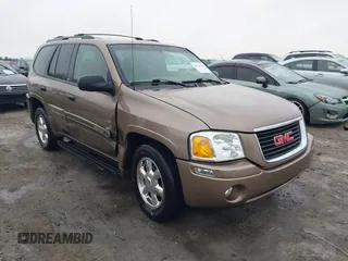 2003 GMC Envoy SLE with VIN 1GKDT13S332264984, listed as a IAAI auction lot 41523191 with 227,004 mi miles. Bid and sale history available at carsss.com. Image 1.