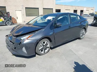2016 Toyota Prius Four z VIN JTDKARFUXG3019426, wystawiony jako IAAI lot #42385785 z przebiegiem 94 838 mil mil oraz . Historia ofert i sprzedaży dostępna na DreamBid. Obrazek 2.