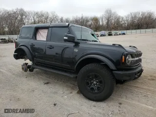 2024 Ford Bronco Wildtrak with VIN 1FMEE2BP7RLA82233, listed as a Copart auction lot 84203664 with 0 mi miles and Salvage Title. Bid and sale history available at carsss.com. Image 4.