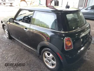 2010 MINI Hardtop with VIN WMWMF3C53ATZ66316, listed as a IAAI auction lot 42142901 with 57,510 mi miles and . Bid and sale history available at DreamBid. Image 3.