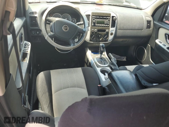 2007 Mercury Mariner Convenience z VIN 4M2YU80Z17KJ15414, wystawiony jako Copart lot #57556855 z przebiegiem 191 412 mil mil oraz Szkody całkowita. Historia ofert i sprzedaży dostępna na DreamBid. Obrazek 8.