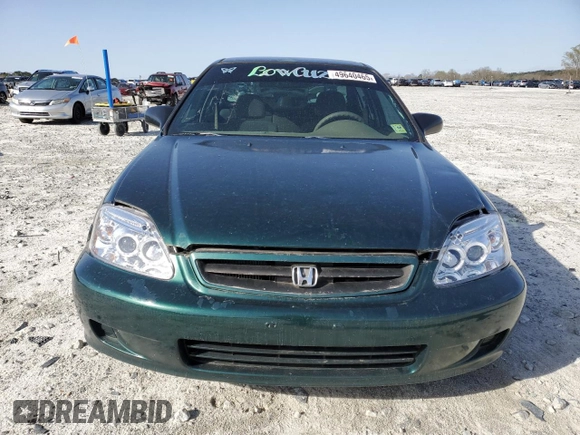 1999 Honda Civic VP z VIN 2HGEJ6617XH527272, wystawiony jako Copart lot #49640465 z przebiegiem 278 909 mil mil oraz Szkoda całkowita • Salvage title. Historia ofert i sprzedaży dostępna na DreamBid. Obrazek 5.