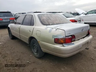 1995 Toyota Camry LE z VIN 4T1SK12EXSU529058, wystawiony jako Copart lot #49055255 z przebiegiem 166 029 mil mil oraz Szkoda całkowita • Salvage title. Historia ofert i sprzedaży dostępna na DreamBid. Obrazek 2.