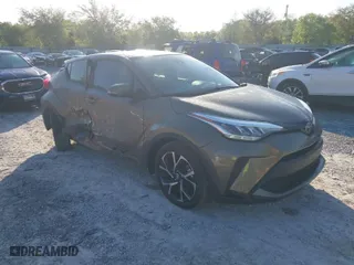 2021 Toyota C-HR LE with VIN NMTKHMBX0MR138934, listed as a IAAI auction lot 42005451 with 31,148 mi miles. Bid and sale history available at carsss.com. Image 1.