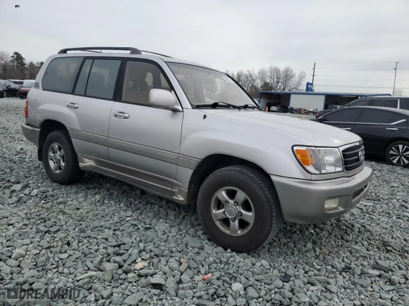 2001 Toyota Land Cruiser with VIN JTEHT05JX12004912, listed as a Copart auction lot 48230735 with 0 mi miles and Salvage Title. Bid and sale history available at carsss.com. Image 4.