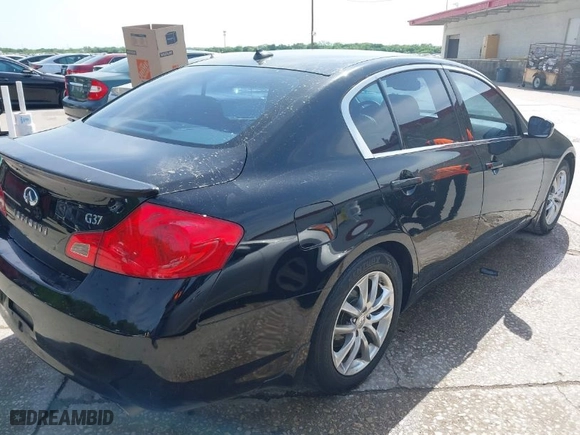 2009 Infiniti G37 Sedan Journey with VIN JNKCV61E99M311135, listed as a IAAI auction lot 42025379 with 198,785 mi miles. Bid and sale history available at carsss.com. Image 4.