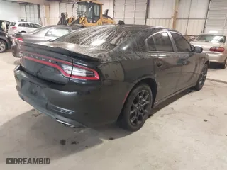 2016 Dodge Charger SXT with VIN 2C3CDXJG6GH341175, listed as a IAAI auction lot 41567137 with 146,476 mi miles. Bid and sale history available at carsss.com. Image 4.