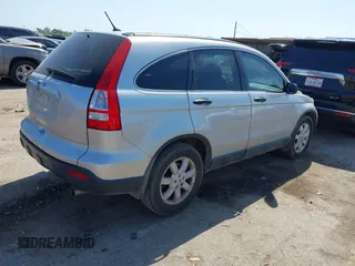 2009 Honda CR-V EX with VIN 3CZRE38559G705051, listed as a IAAI auction lot 42004200 with 185,218 mi miles and . Bid and sale history available at carsss.com. Image 4.