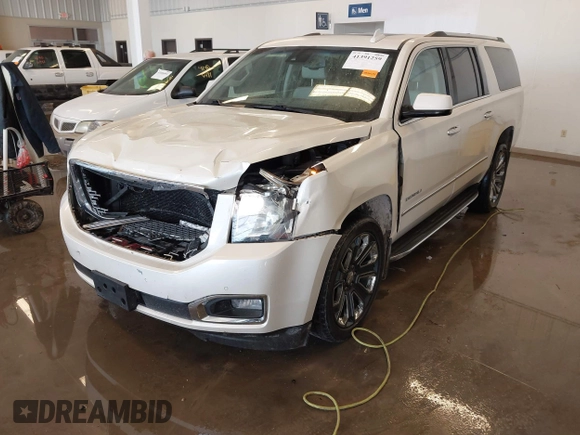 2015 GMC Yukon XL Denali with VIN 1GKS2JKJXFR528927, listed as a IAAI auction lot 41391259 with 159,467 mi miles. Bid and sale history available at carsss.com. Image 19.