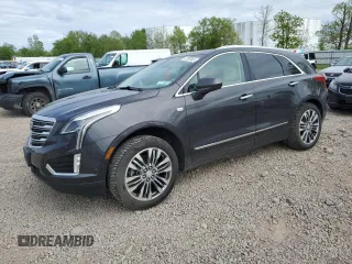 2017 Cadillac XT5 Premium Luxury AWD z VIN 1GYKNERS3HZ325111, wystawiony jako Copart lot #57392565 z przebiegiem 59 440 mil mil oraz Szkody całkowita. Historia ofert i sprzedaży dostępna na DreamBid. Obrazek 1.