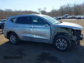 2020 Hyundai Santa Fe SE z VIN 5NMS2CAD7LH269302, wystawiony jako IAAI lot #41833303 z przebiegiem 70 665 mil mil oraz . Historia ofert i sprzedaży dostępna na DreamBid. Obrazek 13.