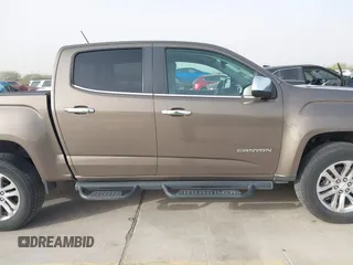 2016 GMC Canyon 2WD SLT with VIN 1GTG5DE38G1271225, listed as a IAAI auction lot 41801681 with 209,454 mi miles. Bid and sale history available at carsss.com. Image 13.