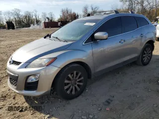 2012 Mazda CX-7 i Touring z VIN JM3ER2C59C0413478, wystawiony jako Copart lot #81480294 z przebiegiem 241 381 mil mil oraz Czysty tytuł • Clean title. Historia ofert i sprzedaży dostępna na DreamBid. Obrazek 1.