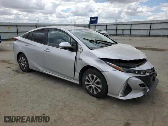 2021 Toyota Prius LE with VIN JTDKAMFP5M3192991, listed as a Copart auction lot 56768095 with 77,515 mi miles and Salvage title. Bid and sale history available at DreamBid. Image 4.