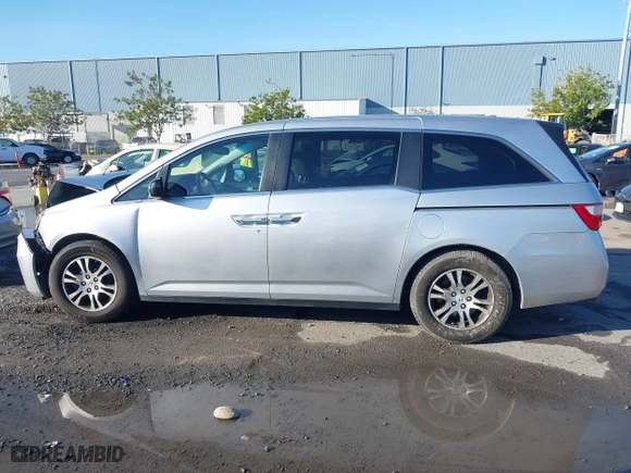 2011 Honda Odyssey EX-L with VIN 5FNRL5H6XBB057556, listed as a IAAI auction lot 41808620 with 154,449 mi miles. Bid and sale history available at carsss.com. Image 14.