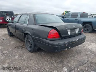 2011 Ford Crown Victoria with VIN 2FABP7AV4BX166216, listed as a IAAI auction lot 41268754 with 205,308 mi miles. Bid and sale history available at carsss.com. Image 3.
