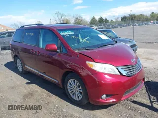 2014 Toyota Sienna XLE with VIN 5TDYK3DC8ES457940, listed as a IAAI auction lot 42039472 with 99,769 mi miles and . Bid and sale history available at DreamBid. Image 1.