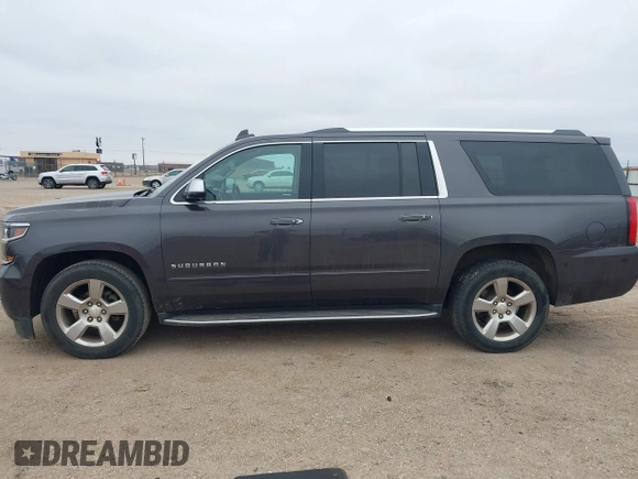 2017 Chevrolet Suburban Premier with VIN 1GNSKJKC3HR201180, listed as a IAAI auction lot 41516652 with Not Provided miles and . Bid and sale history available at DreamBid. Image 14.