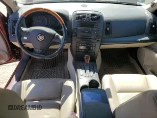 2003 Cadillac CTS z VIN 1G6DM57N830151907, wystawiony jako Copart lot #56451425 z przebiegiem 116 349 mil mil oraz Tytuł czysty. Historia ofert i sprzedaży dostępna na DreamBid. Obrazek 8.