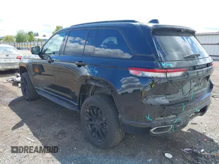 2023 Jeep Grand Cherokee Overland with VIN 1C4RJHDG2PC526889, listed as a IAAI auction lot 42247177 with 71,390 mi miles and . Bid and sale history available at DreamBid. Image 3.