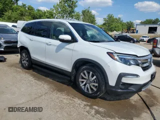 2021 Honda Pilot EX-L with VIN 5FNYF6H58MB084287, listed as a Copart auction lot 59658784 with 32,707 mi miles and Salvage title. Bid and sale history available at DreamBid. Image 4.