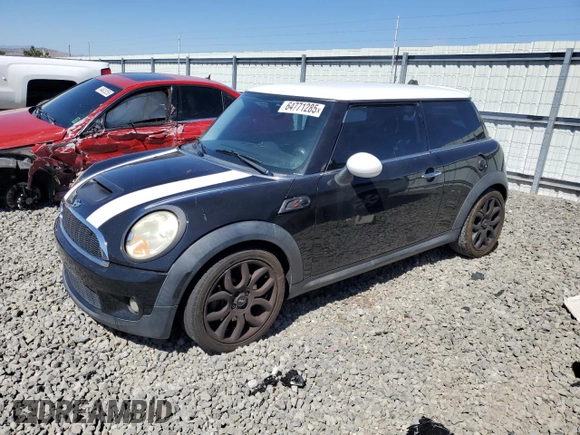 2010 MINI Hardtop S with VIN WMWMF7C57ATX43204, listed as a Copart auction lot 64771285 with 92,236 mi miles and Clean title. Bid and sale history available at DreamBid. Image 1.