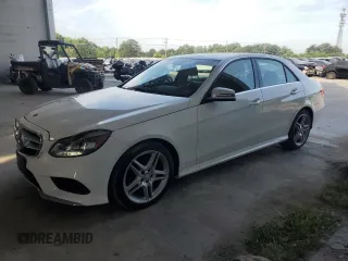 2014 Mercedes-Benz E 350 Sport with VIN WDDHF5KBXEA965310, listed as a Copart auction lot 62078015 with 36,927 mi miles and Salvage title. Bid and sale history available at DreamBid. Image 1.