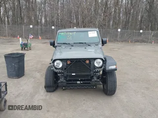 2023 Jeep Wrangler Sport S with VIN 1C4HJXDN0PW638934, listed as a IAAI auction lot 41719467 with 16,686 mi miles and . Bid and sale history available at DreamBid. Image 13.