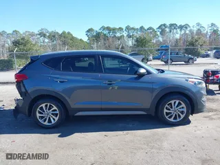 2017 Hyundai Tucson SE Plus with VIN KM8J33A45HU420349, listed as a IAAI auction lot 41296190 with 77,910 mi miles. Bid and sale history available at carsss.com. Image 13.