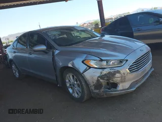 2020 Ford Fusion SE z VIN 3FA6P0HD6LR226325, wystawiony jako IAAI lot #42301302 z przebiegiem 98 189 mil mil oraz . Historia ofert i sprzedaży dostępna na DreamBid. Obrazek 1.