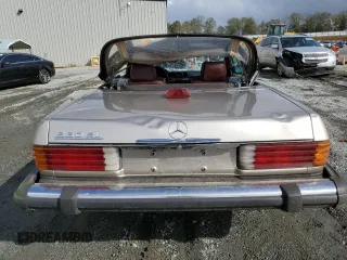 1986 Mercedes-Benz 560 SL with VIN WDBBA48D1GA040918, listed as a Copart auction lot 79708704 with 121,310 mi miles and Salvage Title. Bid and sale history available at DreamBid. Image 6.