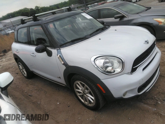 2015 MINI Cooper Countryman S with VIN WMWZC5C51FWP48214, listed as a IAAI auction lot 42102174 with 181,917 mi miles. Bid and sale history available at carsss.com. Image 1.
