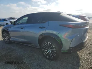 2024 Lexus RZ 300e Premium с VIN JTJABABB2RA003229, выставлен на аукционе Copart как лот 55311235 с пробегом 2 759 миль миль и Списание • Salvage title. История ставок и продаж доступна на DreamBid. Изображение 2.