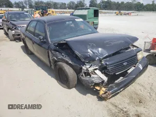 2001 Ford Crown Victoria Police Police Interceptor with VIN 2FAFP71W61X192261, listed as a Copart auction lot 69208974 with 163,632 mi miles and Salvage Title. Bid and sale history available at carsss.com. Image 4.