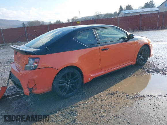 2015 Scion tC with VIN JTKJF5C77FJ008276, listed as a IAAI auction lot 41679236 with 90,987 mi miles. Bid and sale history available at carsss.com. Image 4.