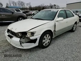 2001 Toyota Camry CE z VIN JT2BG22K210600687, wystawiony jako Copart lot #48807225 z przebiegiem 307 479 mil mil oraz Szkoda całkowita • Salvage title. Historia ofert i sprzedaży dostępna na DreamBid. Obrazek 11.