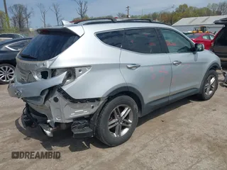 2017 Hyundai Santa Fe 2.4L z VIN 5XYZUDLB6HG400828, wystawiony jako IAAI lot #42013903 z przebiegiem 88 573 mil mil oraz . Historia ofert i sprzedaży dostępna na DreamBid. Obrazek 4.
