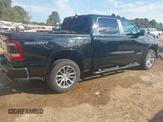 2022 Ram 1500 Laramie with VIN 1C6SRFJT8NN366655, listed as a IAAI auction lot 40564974 with 49,737 mi miles and . Bid and sale history available at DreamBid. Image 4.