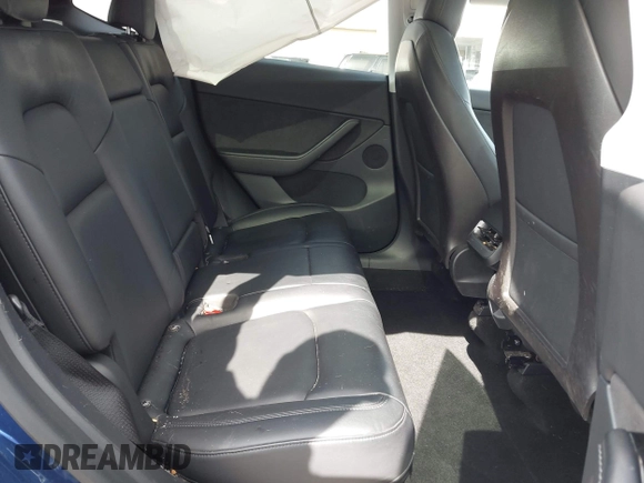 2020 Tesla Model Y Long Range with VIN 5YJYGDEE1LF006227, listed as a IAAI auction lot 42100833 with 49,761 mi miles and . Bid and sale history available at DreamBid. Image 8.
