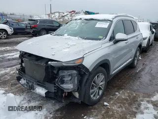 2019 Hyundai Santa Fe Ultimate with VIN 5NMS5CAD1KH000394, listed as a IAAI auction lot 41455421 with 42,886 mi miles and . Bid and sale history available at DreamBid. Image 2.