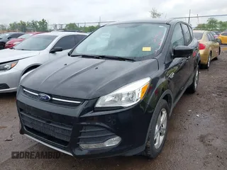 2015 Ford Escape SE with VIN 1FMCU9GX5FUB01864, listed as a IAAI auction lot 42199405 with 114,776 mi miles and . Bid and sale history available at DreamBid. Image 2.