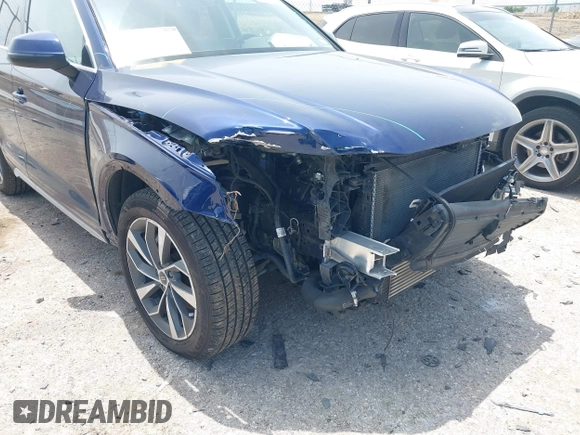 2021 Audi Q5 Premium with VIN WA1AAAFY7M2004975, listed as a IAAI auction lot 42190283 with 56,810 mi miles and . Bid and sale history available at DreamBid. Image 17.