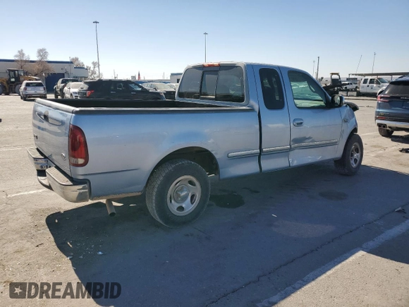 1998 Ford F-150 with VIN 1FTDX1725WKA02303, listed as a Copart auction lot 43471005 with 89,812 mi miles and Salvage title. Bid and sale history available at DreamBid. Image 3.