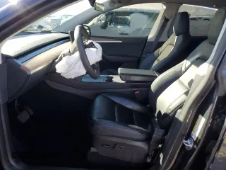 2024 Tesla Model Y Long Range z VIN 7SAYGDEEXRA222408, wystawiony jako Copart lot #49119125 z przebiegiem 20 773 mil mil oraz Szkoda całkowita • Salvage title. Historia ofert i sprzedaży dostępna na DreamBid. Obrazek 7.